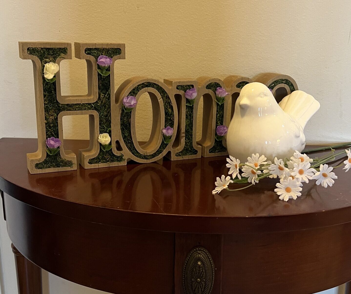 home sign with bird